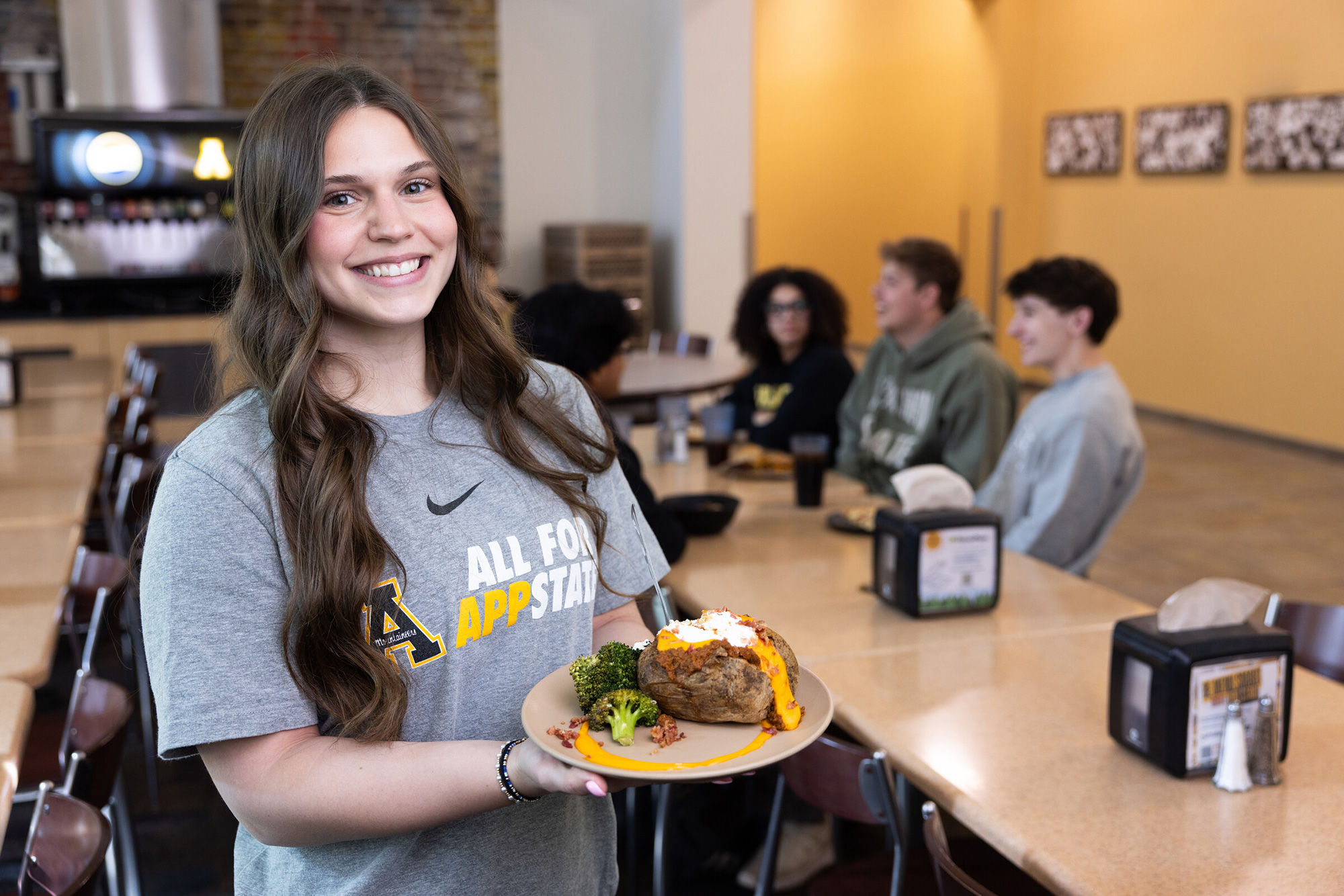 Student with food at Central Dining Hall